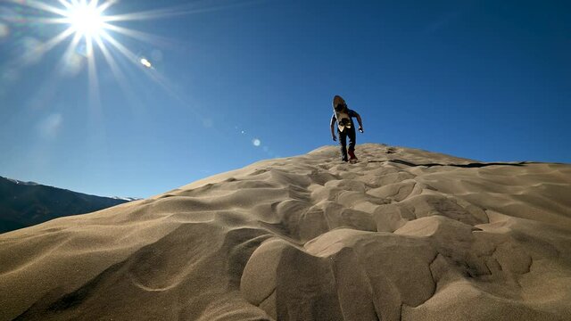 Hiking up a ridge in Great Sand Dunes National Park, Colorado