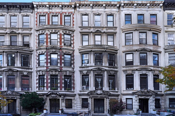 Manhattan street with elegant upper class townhouses