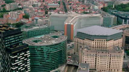Establishing Aerial View of Brussels Downtown with Political Landmark - headquarters of the EU Commission Berlaymont in European Quarter. Office buildings in Bruxelles, Belgium. 4K drone zoom in shot - Powered by Adobe