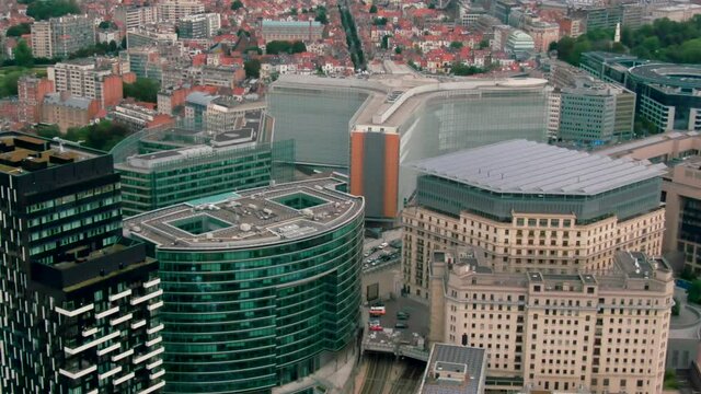 Establishing Aerial View of Brussels Downtown with Political Landmark - headquarters of the EU Commission Berlaymont in European Quarter. Office buildings in Bruxelles, Belgium. 4K drone zoom in shot