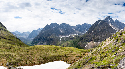 The beautiful valley of the Middle Sakukan river against the backdrop of the Kodar mountain range. Trans-Baikal Territory, Kodar National Park.