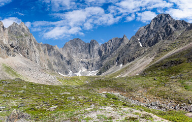 The beautiful valley of the Middle Sakukan river against the backdrop of the Kodar mountain range. Trans-Baikal Territory, Kodar National Park.