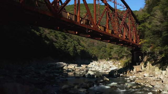 Red Iron Bridge on Abandoned Fukuchiyama Line Hiking Trail, Low Angle View