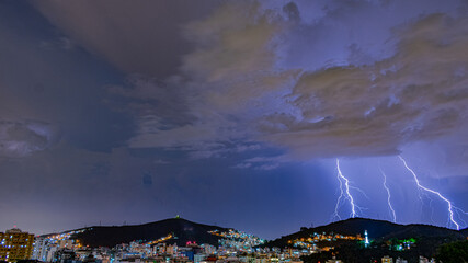 Arrival of a strong storm with lightning and rain. These weather conditions are typical of the Brazilian summer.