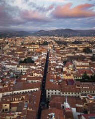 Obraz premium Sunset over the red roofs in Florence Italy