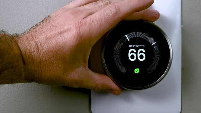 Adjusting temperature on a smart thermostat for home