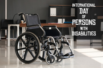 Empty wheelchair in office. International Day of Persons with Disabilities