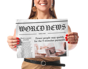 Young businesswoman holding newspaper on white background - obrazy, fototapety, plakaty