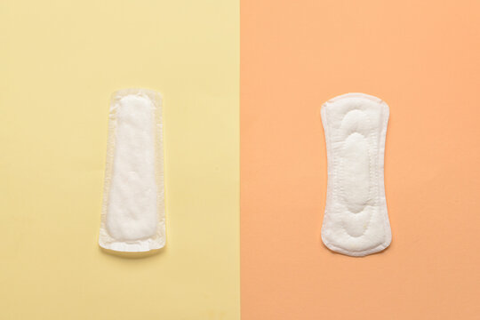 Menstrual pads on yellow background