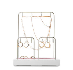 Organizer with stylish jewelry on white background
