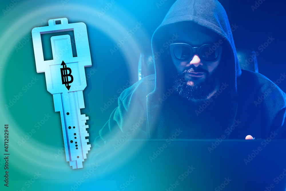 Poster electronic key from a bitcoin wallet. key with bitcoin logo. concept - a hacker breaks into a bitcoi