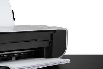 Laser home printer on table against white backgorund