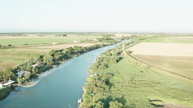 Aerial view of fishing huts in the river, Lido di Dante, Fiumi Uniti, Ravenna near Comacchio valley.