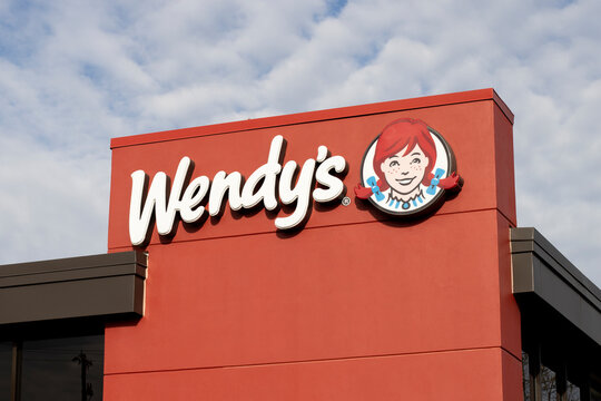 Hillsboro, OR, USA - Nov 17, 2021: Closeup of the Wendy's sign seen at one of its chain restaurants in Hillsboro, Oregon. Wendy's is now the one of the top 3 breakfast players among burger chains.