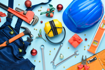 Set of construction tools and Christmas decor on color background