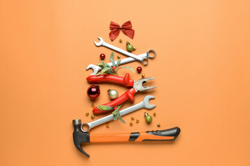 Christmas tree made of construction tools on color background - obrazy, fototapety, plakaty
