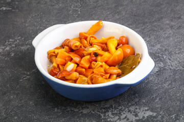 Marinated pickled honey mushrooms in the bowl