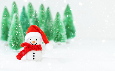 Naklejka na ściany i meble Christmas winter background with snowman and Christmas trees