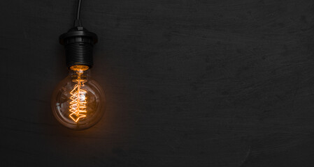 
Light bulb on black background
