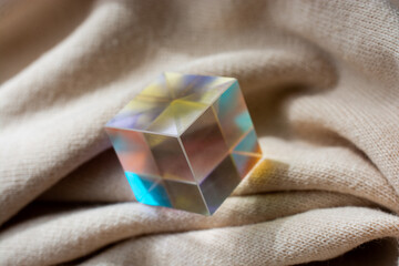 Optical glass cubes scatter spectrum light with all the colors of the rainbow on the surface