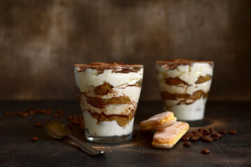 Tiramisu - traditional italian coffee dessert from mascarpone cheese and biscuit.