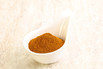 Dry Paprika powder in the bowl