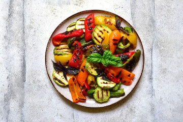 Grilled colorful vegetable : bell pepper, zucchini, eggplant. Top view with copy space.