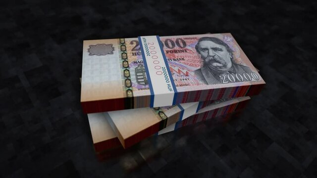 Hungarian Forint money pile pack. Concept background of economy, banking, business, crisis, recession, debt and finance in Hungary. 20000 HUF banknotes stacks animation.