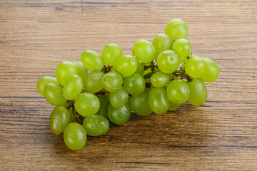 Ripe sweet green grape branch