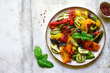 Grilled colorful vegetable : bell pepper, zucchini, eggplant. Top view with copy space.