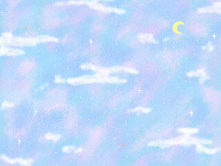 淡い色合いの三日月の夜空