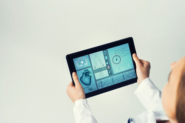 Close of female doctor hands working with tablet pc computer