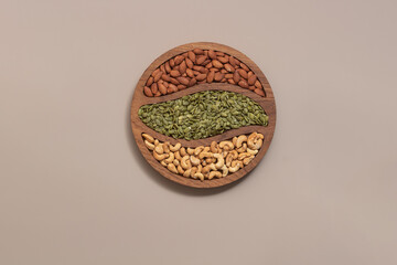 assorted different nuts on a background with a place for text