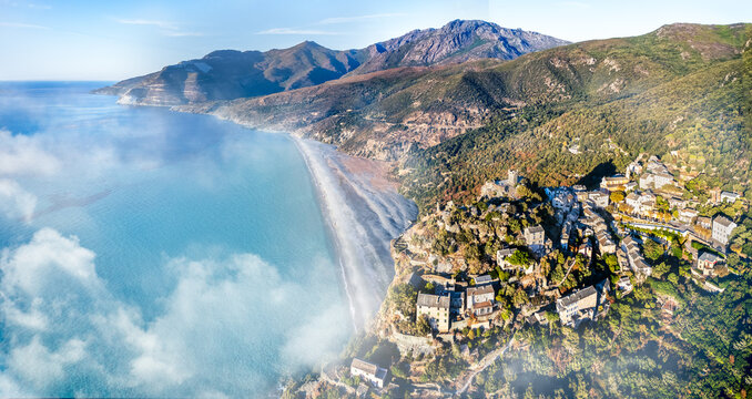 Aerial view with Nonza village , Corsica island, France