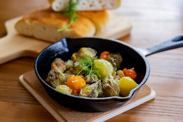 ajillo with vegetables in a skillet