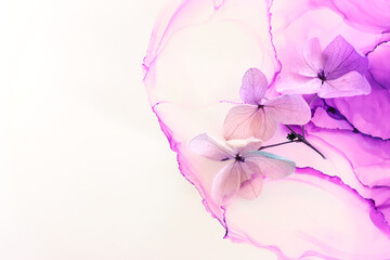 Creative image of pastel violet and pink Hydrangea flowers on artistic ink background. Top view...