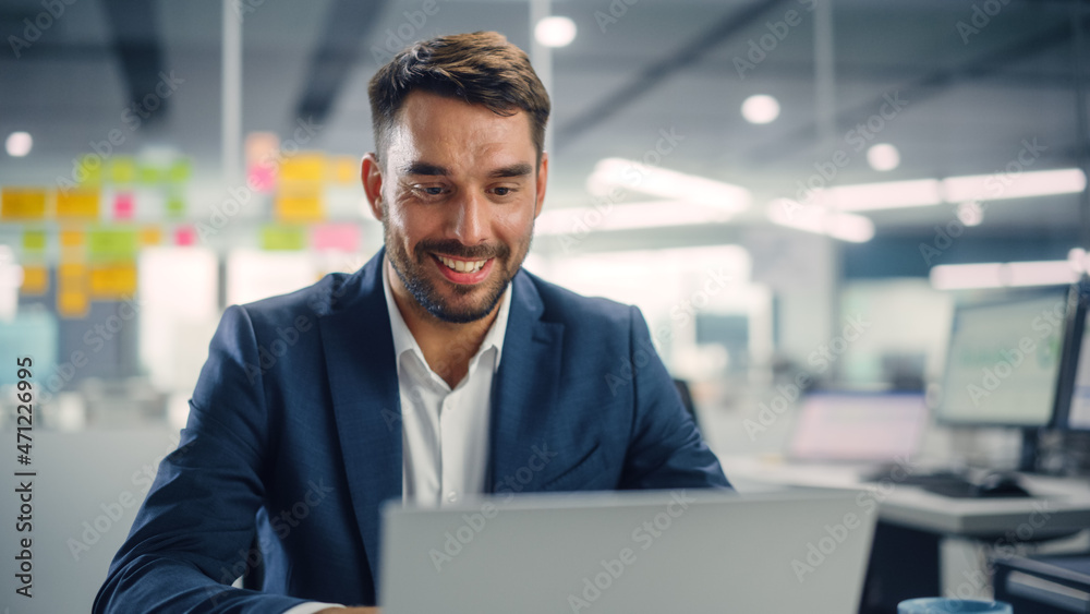 Leinwandbilder busy young businessman using laptop computer in modern office. manager thinks about successful finan
