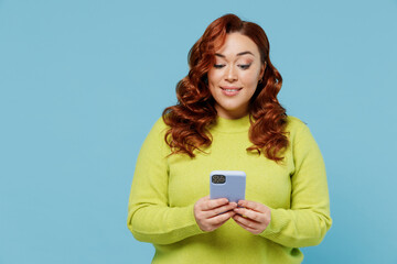 Young smiling cheerful happy fun chubby overweight plus size big fat fit woman in green sweater...