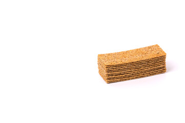 Pile of bread cracker snacks isolated over the white background.