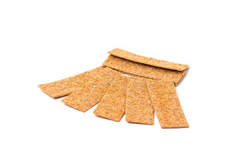 Pile of bread cracker snacks isolated over the white background.