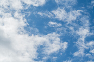 The bright blue sky was surrounded by white clouds, the atmosphere was like heaven.