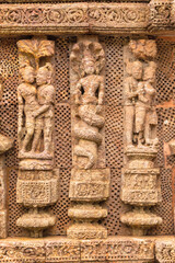 Temple platform of Jagamohana carved with  erotic couples, young women flaunting their beauty in poses, nagas, vyalas, soldiers, elephants, court scenes Sun Temple Konark, Odisha, India.