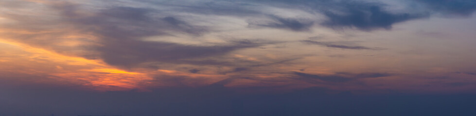 Beautiful view of sky with clouds at sunrise. Partly cloudy. Colorful sunset. Natural sky background texture, beautiful color.