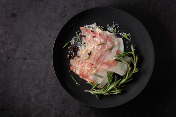 Bacon with rosemary, salt, and pepper.