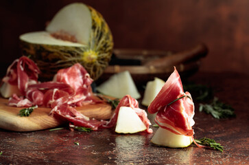 Juicy melon with prosciutto and rosemary.
