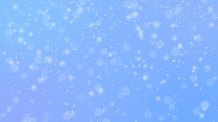 snow fall and bokeh on blue winter background