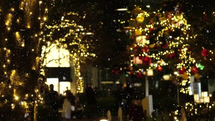 TOKYO, JAPAN - NOV 2021 : Christmas illumination, led light up, Christmas tree and snow at Roppongi area. Scenery of downtown city and street at night. Japanese winter and Christmas season concept. - Powered by Adobe