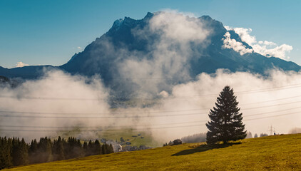 Beautiful alpine summer view on a cloudy morning with the famous Zugspitze summit, top of germany,...