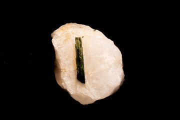 beautiful tourmaline in Quartz Crystal cluster gemstone isolated on black background