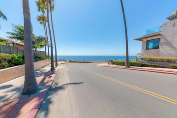 Highway with palm trees near the beach at La Jolla in California